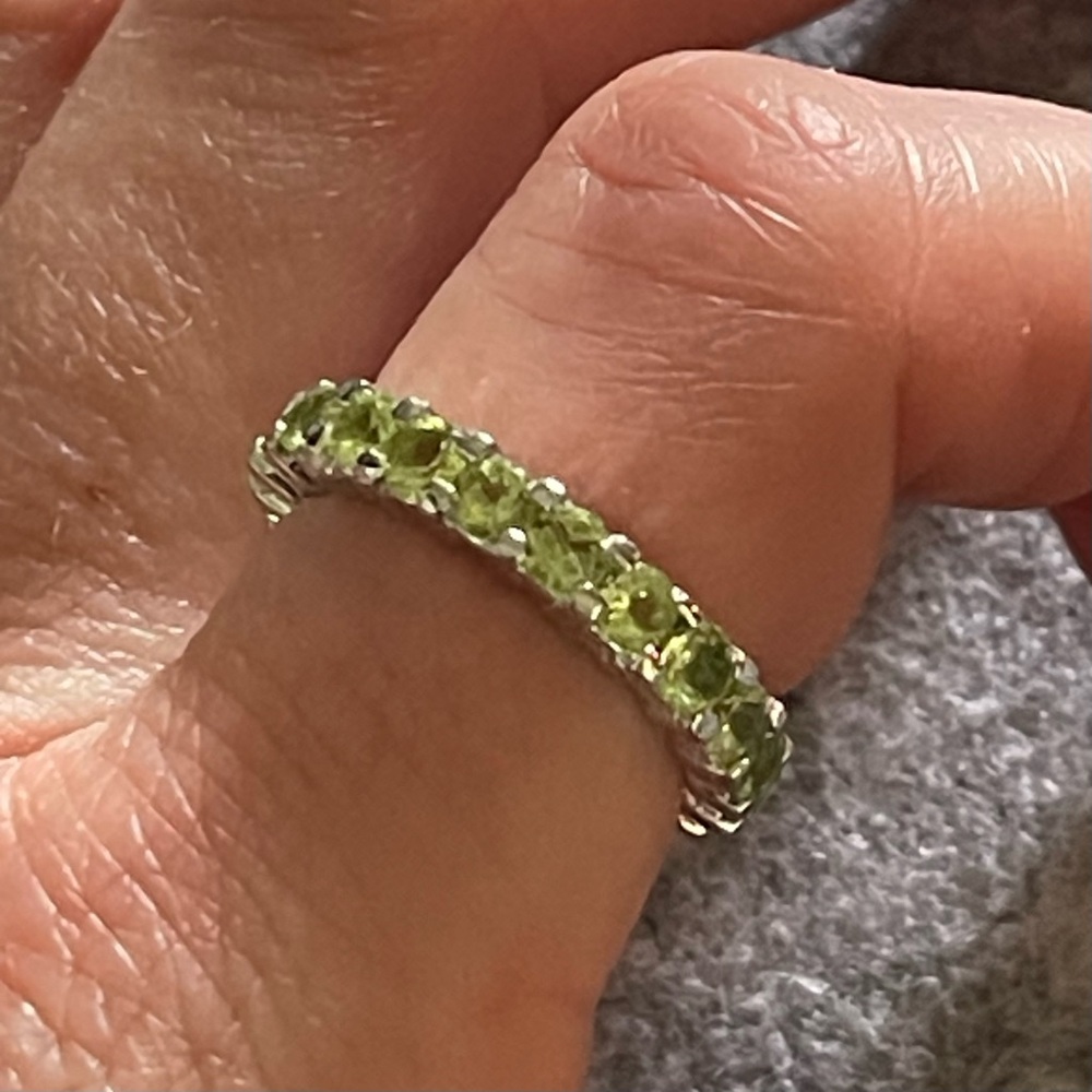 925 Sterling silver eternity ring band, possibly peridot.